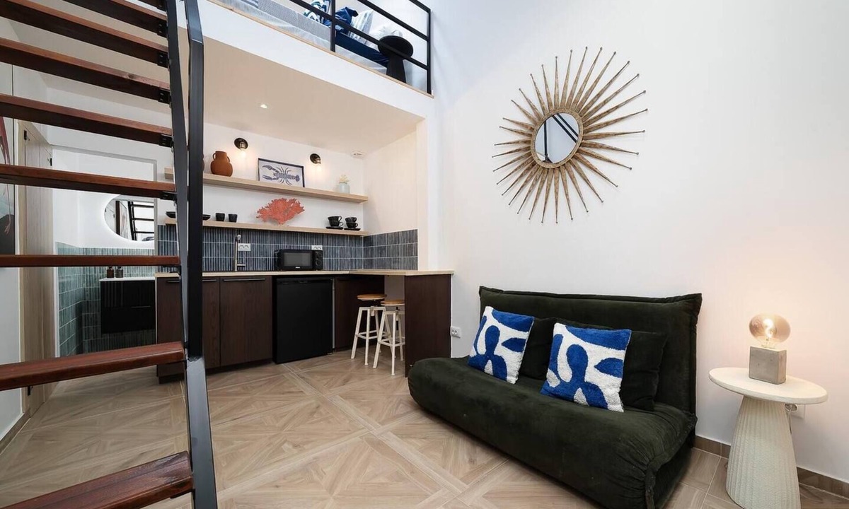 Portimao City Centre Apartment | Charming historic tiny house in Portimão's vibrant old town, steps from the marina and promenade. Easy access to Algarve beaches. Sleeps 4. Pets welcome. Self check-in via lockbox.