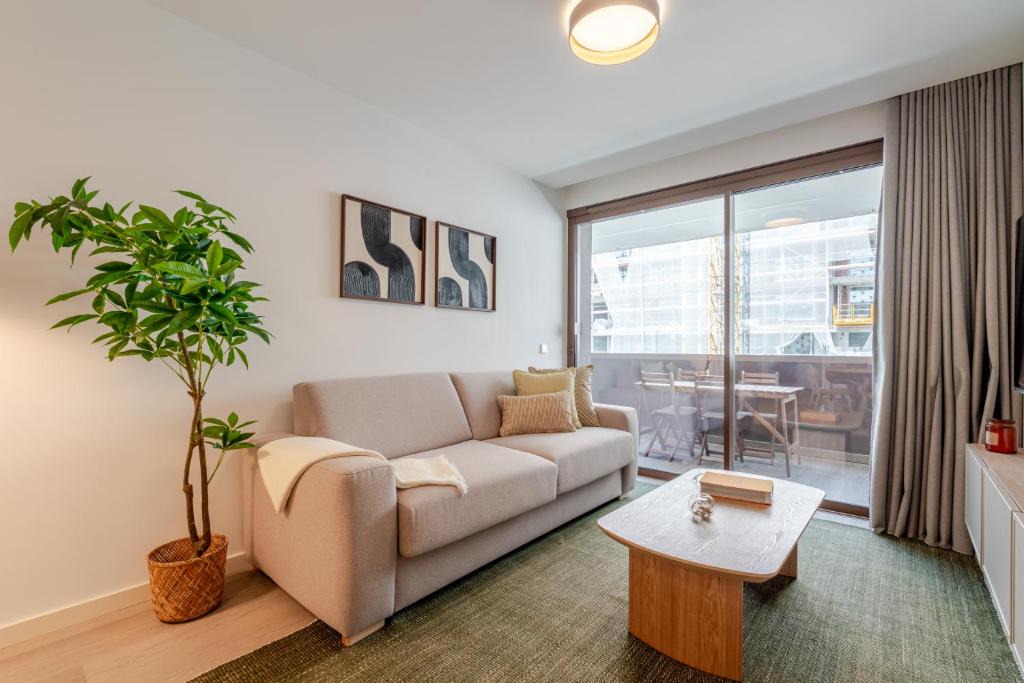 Santa Marinha Apartment | Premium Living with Pool, Balcony, Gym & Garage by HostWise