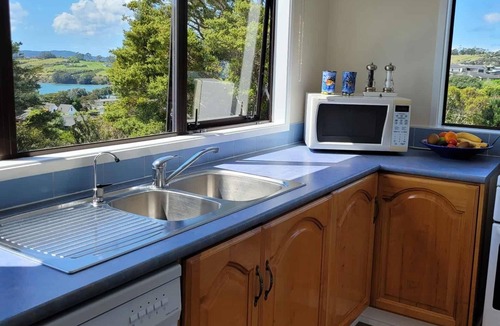 Algies Bay House | 5 bedroom seaside getaway with great views only mins to the beach.