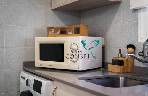 Meia Praia Apartment | Casa Colibri I Seafront Apartment with Wi-Fi and Air Conditioning