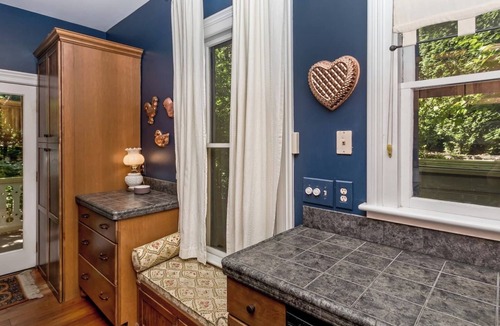 Historic Montford Cottage | Historic Cottage Retreat walk to downtown porch swings cozy fireplaces