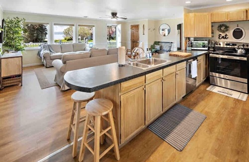Lodi Cottage | Lakefront living at its best—private dock, kayaks, firepit, and a beautifully updated cottage just moments from the Wine Trail.