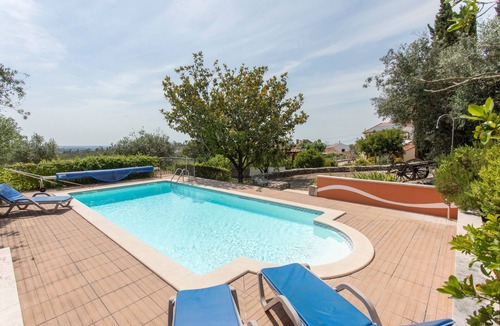 Camparca House | Palheiro: Holiday Home with Mountain Views, Wi-Fi & Air Conditioning