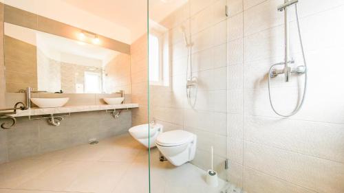 Vale de Centianes Villa | Villa Bloom Coast - Moradias com 2 Piscinas Aquecíveis e BBQ