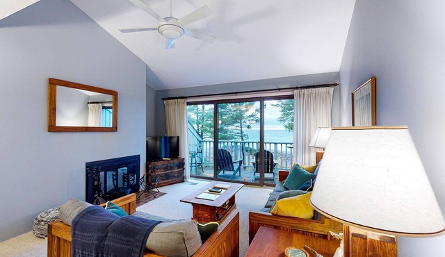 Beachfront condo with beach access, fireplace, balcony, washer/dryer & views in Glen Arbor