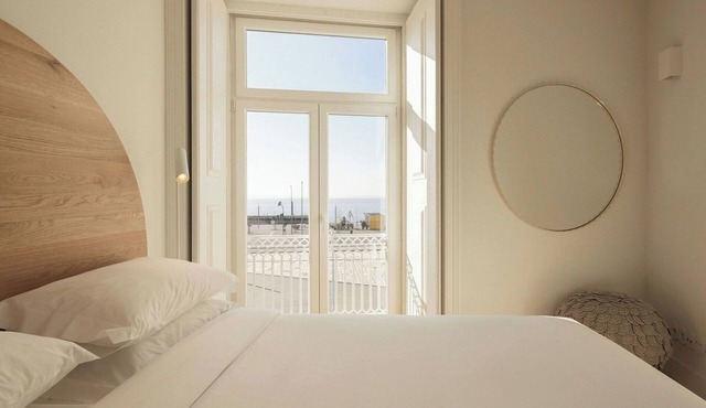 Elegant 1BR | Stunning Tagus Views | Steps to Praça do Comércio Lisbon