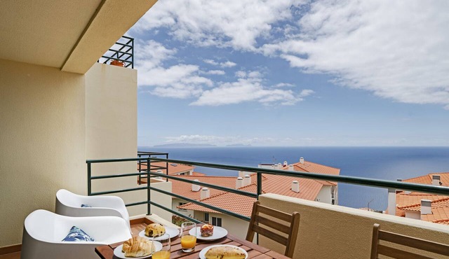 Garajau II, with large balcony and sea view.