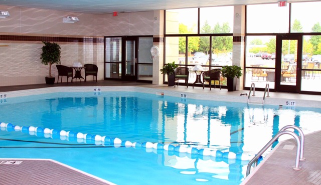 King Suite Near Syracuse University | Free Breakfast + Fitness Center in Liverpool