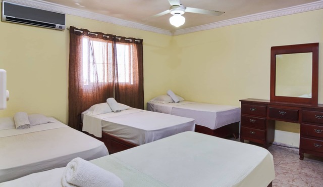 Spacious 2-Bedroom Apartment with Private Terrace Near SDQ Airport Fast Wi-F in Santo Domingo Este