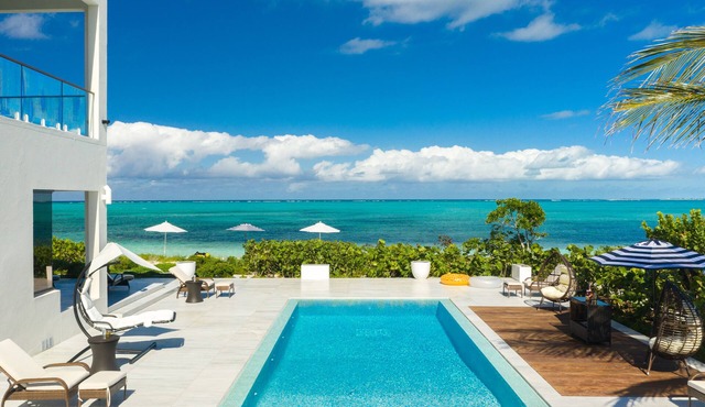 Villa DelEvan 4E/Beachfront 6 bedroom house on the Grace Bay Beach, in Providenciales