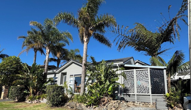 Your coastal escape. Walk to the beach. Private spa, whole house access.