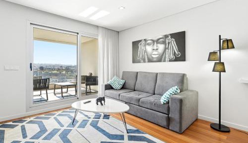 Three-Bedroom Apartment with Water View