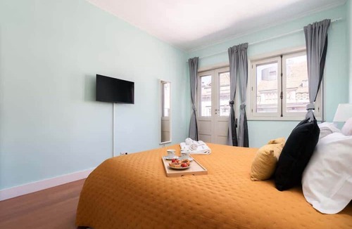 Centro / Baixa Apartment | 3 Colorful Bright Flats w/Balcony by HostWise