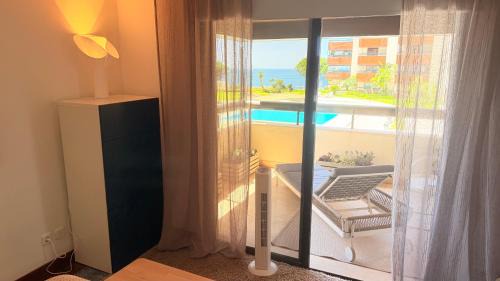 Cascais Apartment | Ocean view one bedroom apartment with garage and swimming pool in Costa da Guia