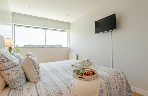 Campanha Apartment | Stylish Home with Balcony & Garage by HostWise