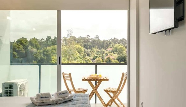 Balcony 2BRs with Pool & Parking by HostWise